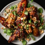 Garlic Soy Chicken Wings with Herbs & Peanuts First Image